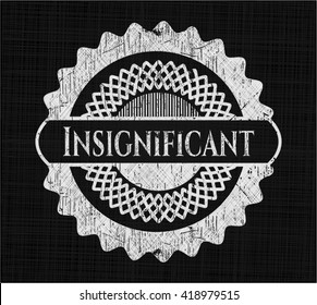 Insignificant written on a blackboard