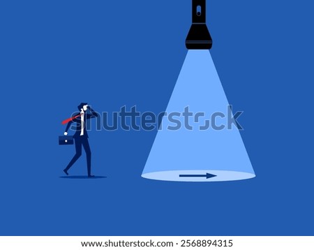 Inspiration, help find a way out. Businessman follow the guiding light