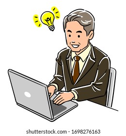 Inspirational businessman operating a personal computer