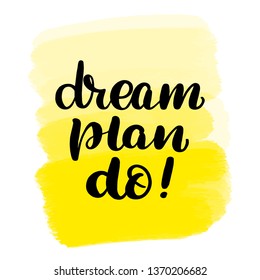 Inspirational handwritten brush lettering dream plan do. Yellow watercolor stain on background.
