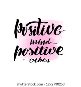 Inspirational handwritten brush lettering inscription positive mind, positive vibes. Pink watercolor stain on background.