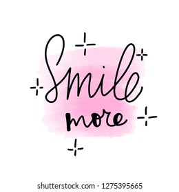 Inspirational handwritten brush lettering inscription smile more. Pink watercolor stain on background.