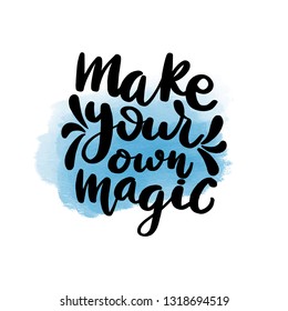 Inspirational handwritten brush lettering inscription make your own magic. Blue watercolor stain on background.