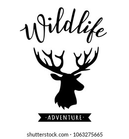 Inspirational label with silhouette of a deer, vector illustrations and "Wildlife" lettering.