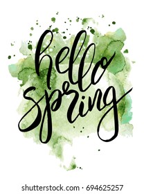  Inspirational lettering hand drawn quote Hello spring on colorful green watercolor splash background. Beautiful motivational template for card and prints. Vector brush calligraphy.