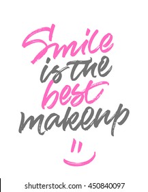 Inspirational phrase 'Smile is the best makeup'. Romantic and warm greeting card or inspiring poster design. Handwritten brush calligraphy.