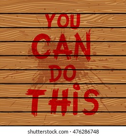 Inspirational quote You Can Do This on brown wooden board. Hand written calligraphy, brush painted letters. Vector illustration.