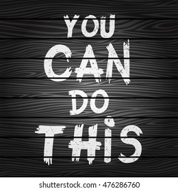 Inspirational quote You Can Do This on black wooden board. Hand written calligraphy, brush painted letters. Vector illustration.