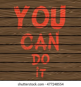 Inspirational quote You Can Do It on brown wooden board. Hand written calligraphy, brush painted letters. Vector illustration.