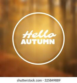 Inspirational Sentence. "Hello autumn" on a Blurred Background