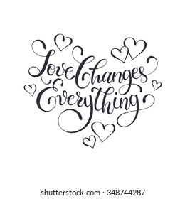 Inspiring lettering black on white. Love changes everything. Positive quote with swirls in heart shape. Modern calligraphy for T-shirt and postcard design. Happy Valentine's Day.