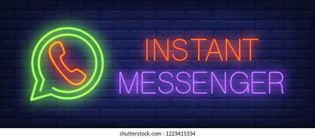 Instant messenger neon sign. Glowing inscription with green chat icon and red headset on dark blue brick background. Can be used for internet, communication, smartphones, web, chatting