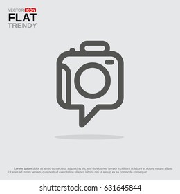 Instant photo geotag icon or logo. Line image of photo camera as a tag or speech bubble.
Monochrome and isolated on grey.