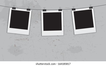 Instant photos with clips in grunge background vector illustration