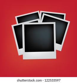 Instant photos isolated on a red background