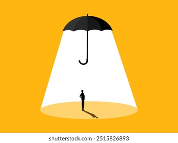 Insurance. Businessman standing under a protective umbrella