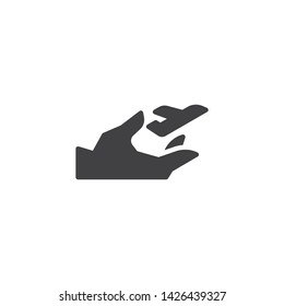 Insurance flights vector icon. Hand with plane filled flat sign for mobile concept and web design. Travel insurance glyph icon. Symbol, logo illustration. Vector graphics