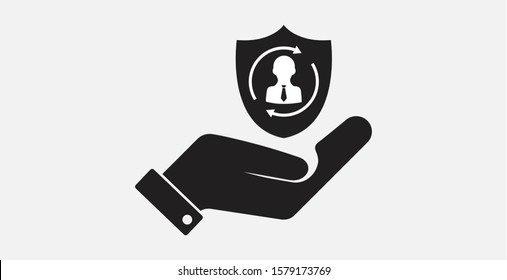 Insurance icon. Insurance shield with businessman icon in a hand. Shield protection vector.Privacy icon. Authentication security . Filled vector icon