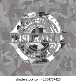 Insurance on grey camouflaged texture