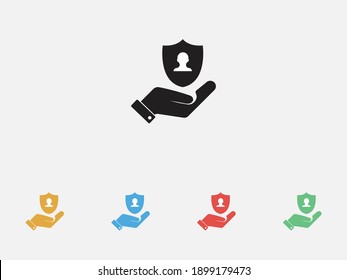 Insurance shield with user icon in a hand. Shield protection vector icon.Privacy icon. Authentication security . Filled vector icon