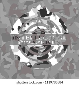 Intellectual property on grey camouflage texture