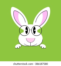 Intelligent rabbit wearing glasses. Postcard with animals on a green background 