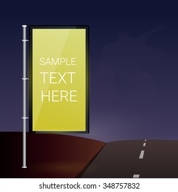 Interactive TV banner near the road. In the night time.