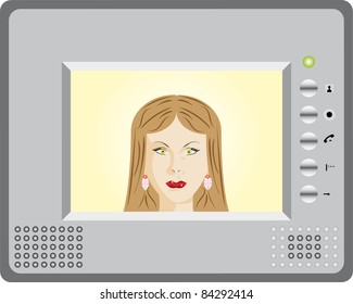 Intercom with video display. Woman using an intercom.