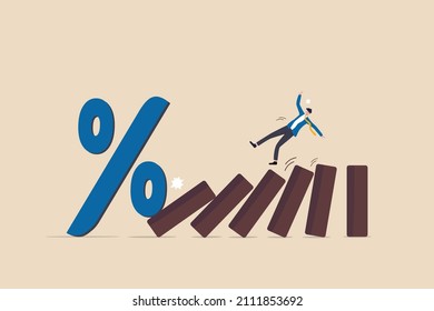 Interest rate and inflation percent impact economy and investment market, federal reserve monetary policy concept, percentage sign fall to cause domino collapse causing businessman investor falling.