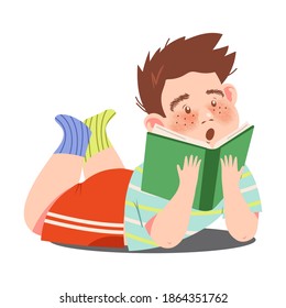Interested Boy Character Lying with Open Book and Reading Vector Illustration