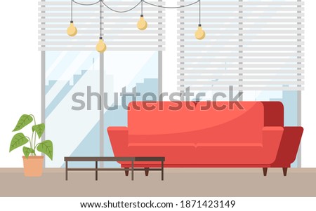 Interior design of a living room. Red sofa against the background of a large panoramic window. Potted plant next to the coffee table. Furniture for the interior of a room for receiving guests and rest