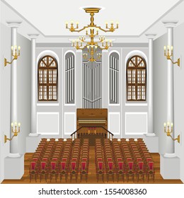 interior of a large organ hall with columns and organ