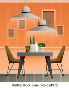 Interior of orange dining room with lamps and pictures on the wall