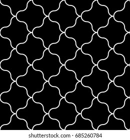 Interlocking black figures tessellation on white background. Image with floral shapes. Ethnic mosaic tiles motif. Oriental window tracery. Seamless surface pattern design with scales ornament. Vector.