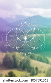 Interlocking circles flower of life sacred geometry illustration with golden ratio digits in front of photographic background.