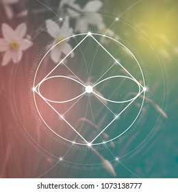 Interlocking circles and triangles hipster sacred geometry illustration with golden ratio digits in front of photographic background.