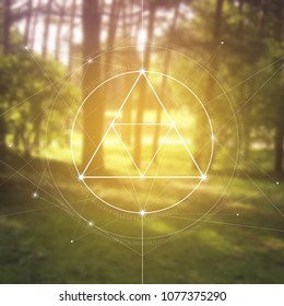 Interlocking circles and triangles hipster sacred geometry illustration with golden ratio digits in front of photographic background.