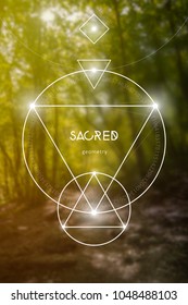Interlocking circles and triangles sacred geometry illustration with golden ratio digits and copy space in front of photographic background.