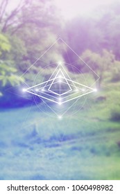 Interlocking circles and triangles sacred geometry illustration with golden ratio digits in front of photographic background.