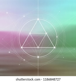 Interlocking circles, triangles and squares hipster sacred geometry illustration with golden ratio digits and light dots in front of photographic background.