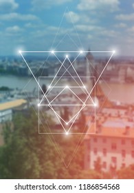 Interlocking  triangles and squares hipster sacred geometry illustration with light dots in front of photographic background.