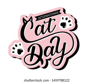 International Cat Day art sign. Hand drawn vector logotype with lettering typography and cat paws isolated on background. Illustration with celebration quote for clothe, print, banner, badge, poster