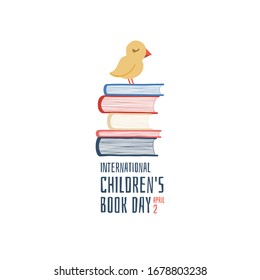 International Children's Book Day. pile of books. A pile of books and a birdie on them.