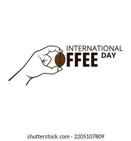 International coffee day with hand holding coffee bean and unique concept