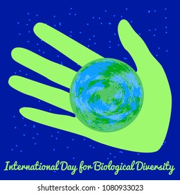 International Day for Biological Diversity. The concept of ecological holiday. Green hand holding a Earth. Blue night background. Event name