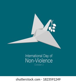International day of non-violence. October 2. Dove flying with a green leaves branch in its beak.