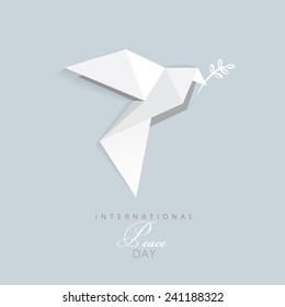 international day of peace- vector illustration of white origami dove with olive branch- flat design style