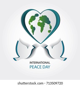 International day of peace.Vector illustration of white paper cutout doves. Realistic pigeon notch. Creative idea. 3d white bird and planet symbol. Template for wedding, banner, poster, advertisement.