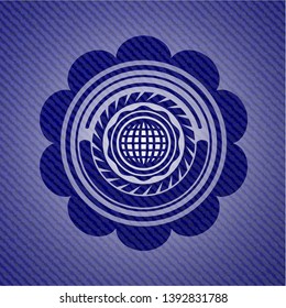 international icon inside badge with denim background