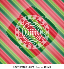 international icon inside christmas colors badge.